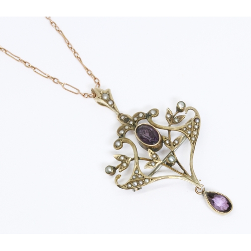 14 - An Edwardian amethyst and seed pearl pendant, marked '9ct', length 50mm, suspended on 46cm chain wit... 