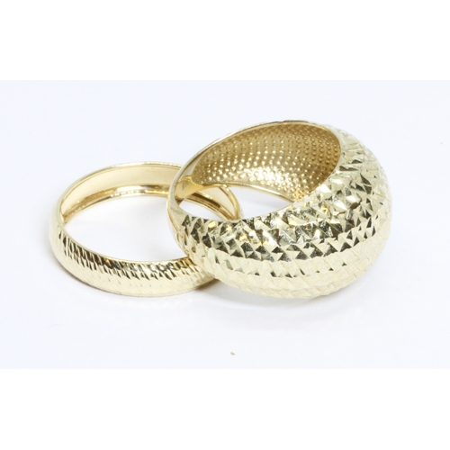 28 - A hallmarked 9ct gold engraved ring and similar band marked '9K', gross weight 5.4g, size R & W resp... 