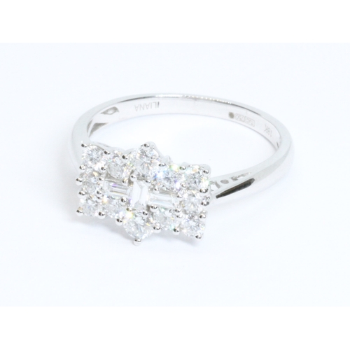 29 - A hallmarked 18ct white gold diamond cluster ring, the cluster measuring approximately 13mm x 11mm, ... 