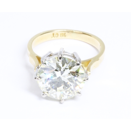 57 - A diamond solitaire ring, the round brilliant cut stone weighing approx. 4.80ct, the approximate qua... 