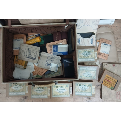 89 - Frank King, a velum suit case containing a quantity photographic negatives and photograph post cards... 