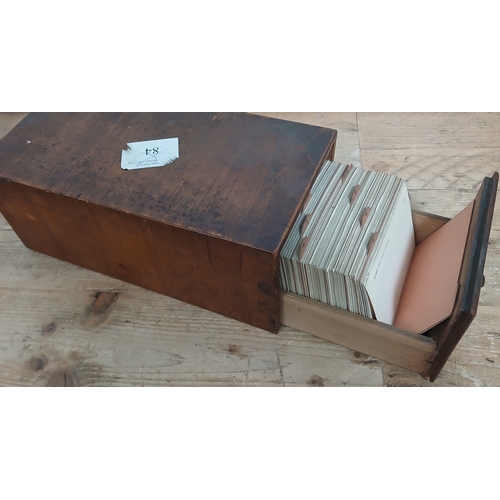 91 - Frank King, an oak file drawer containing a (likely) complete list of work, circa 1950s.