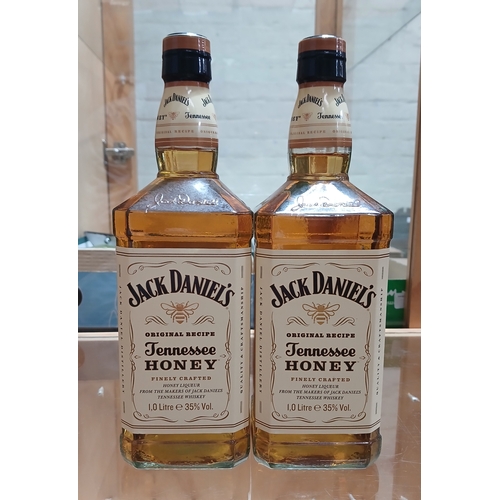 211 - Jack Daniels Tennesse Honey, two 1 litre bottles, sealed.