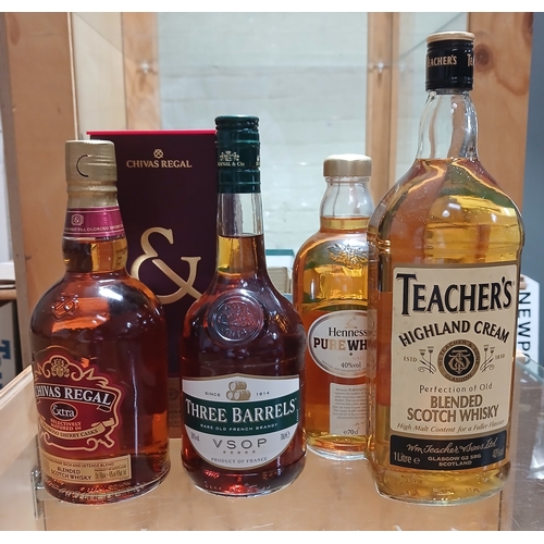 223 - Four bottles of assorted blended scotch whisky/cognac.