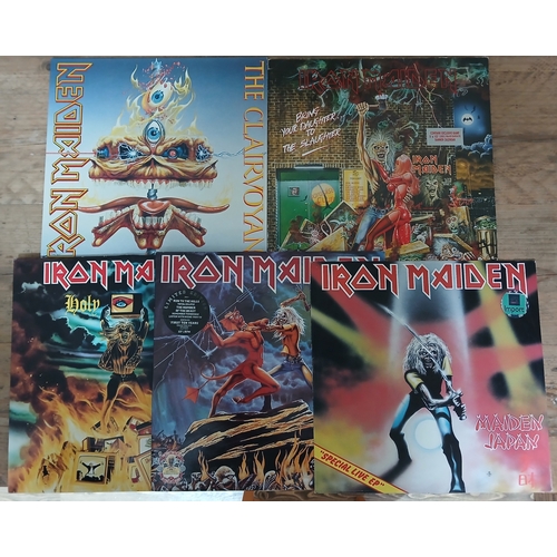 326 - Iron Maiden - a group of five assorted 12