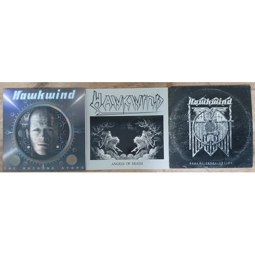 335 - Hawkwind - a group of three assorted LPs.