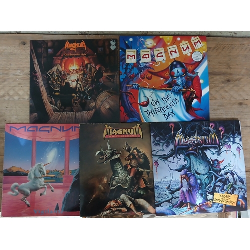 351 - Magnum - a group of five assorted LPs.