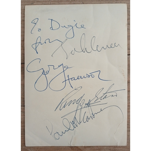 412 - The Beatles, an autographed black and white photograph, autopen facsimiles to front 'Paul Ringo Geor... 