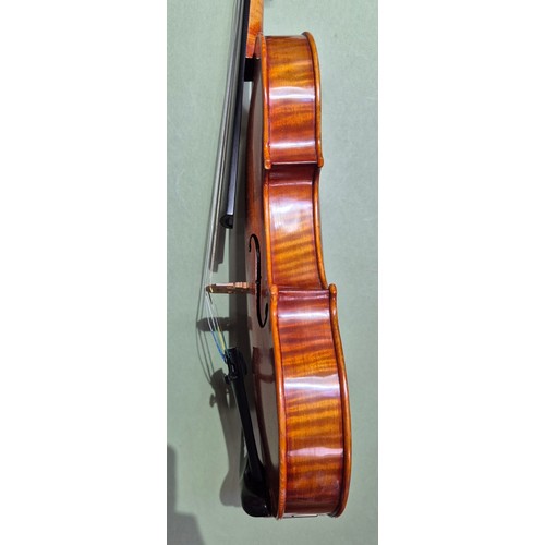 421 - A Chinese Stentor Arcadia student violin, together with bow signed 'Arnold Voigt' and hard case.