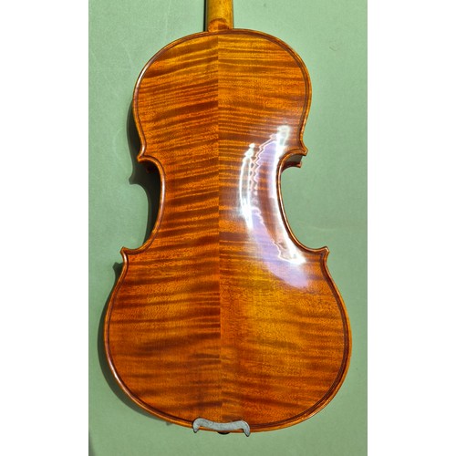 421 - A Chinese Stentor Arcadia student violin, together with bow signed 'Arnold Voigt' and hard case.
