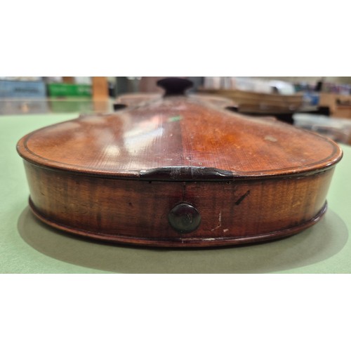 423 - An antique violin (AF) with hard case and bow.