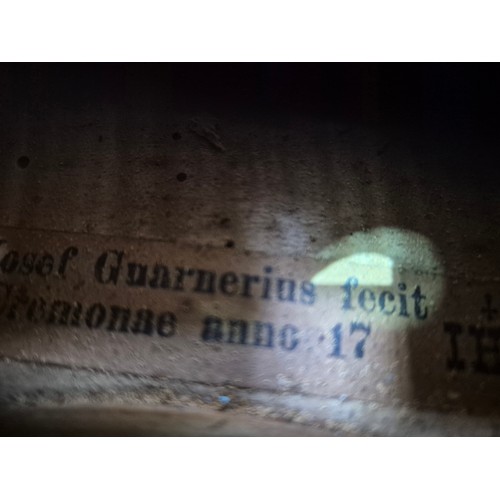 423 - An antique violin (AF) with hard case and bow.