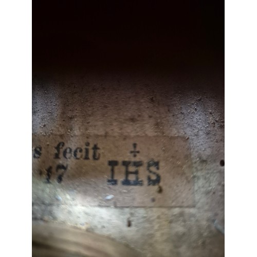 423 - An antique violin (AF) with hard case and bow.