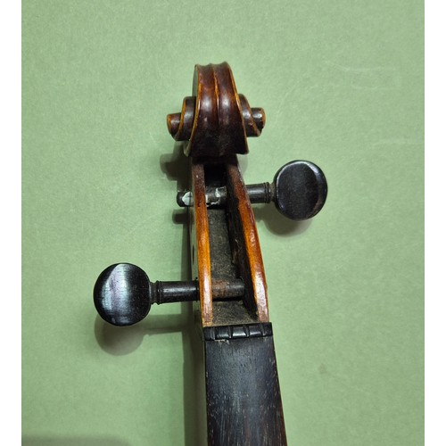 423 - An antique violin (AF) with hard case and bow.