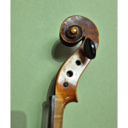 423 - An antique violin (AF) with hard case and bow.
