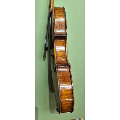 423 - An antique violin (AF) with hard case and bow.