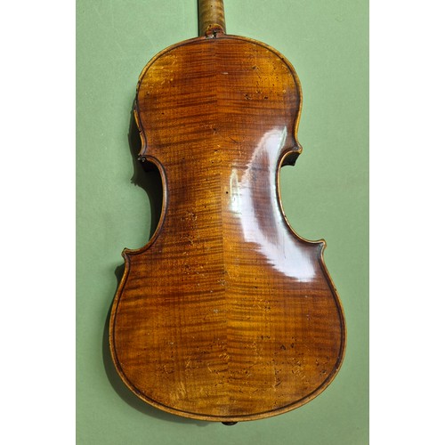 423 - An antique violin (AF) with hard case and bow.