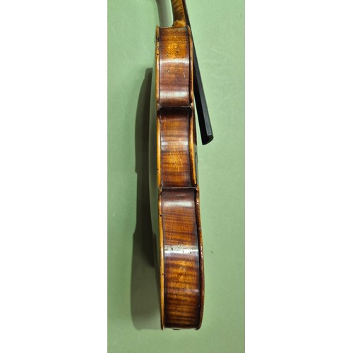 423 - An antique violin (AF) with hard case and bow.