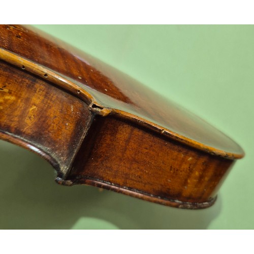 423 - An antique violin (AF) with hard case and bow.