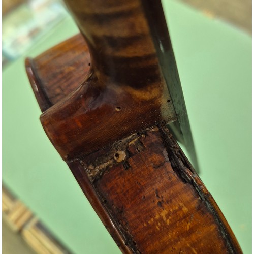 423 - An antique violin (AF) with hard case and bow.