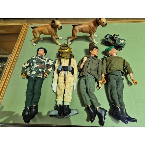 444 - Two boxes of assorted ActionMan toys.