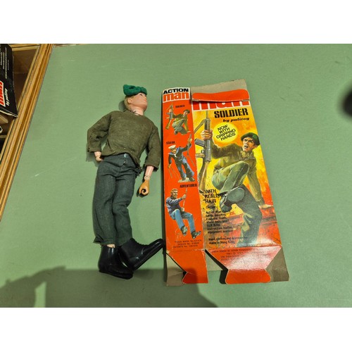 444 - Two boxes of assorted ActionMan toys.