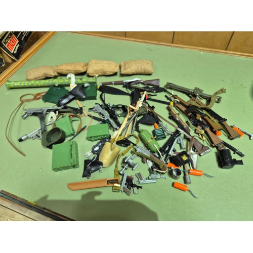 444 - Two boxes of assorted ActionMan toys.