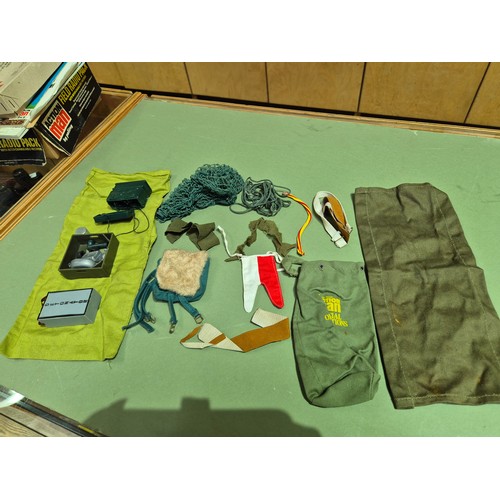 444 - Two boxes of assorted ActionMan toys.