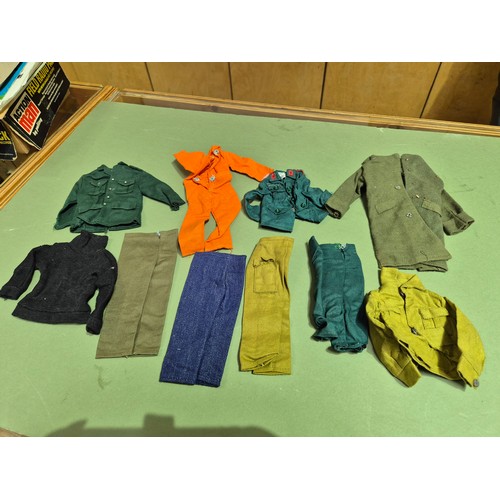 444 - Two boxes of assorted ActionMan toys.