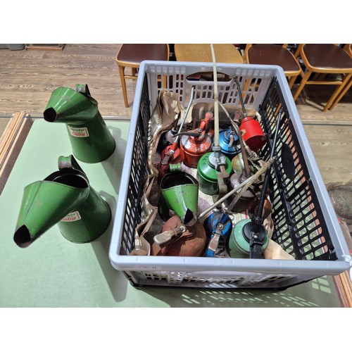 190H - A box of assorted vintage oil cans to include Castrol etc.