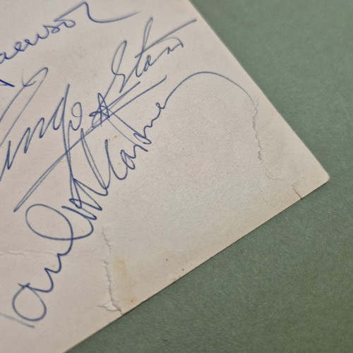 412 - The Beatles, an autographed black and white photograph, autopen facsimiles to front 'Paul Ringo Geor... 