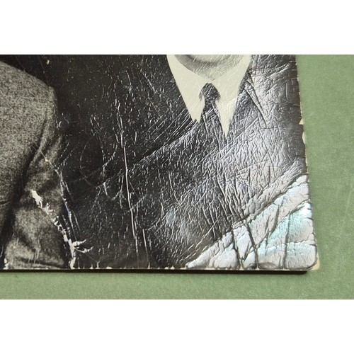 412 - The Beatles, an autographed black and white photograph, autopen facsimiles to front 'Paul Ringo Geor... 