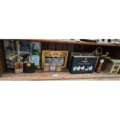28 - A quantity of miniature alcoholic gift sets, miniatures and half bottles, including port, Disaronno,... 