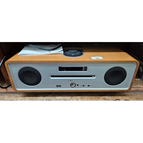 29 - A Ruark R41 integrated music system with remote and instruction booklet
