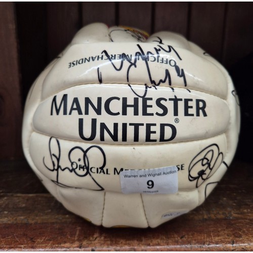 9 - A signed Manchester United football, possibly season 2000-01