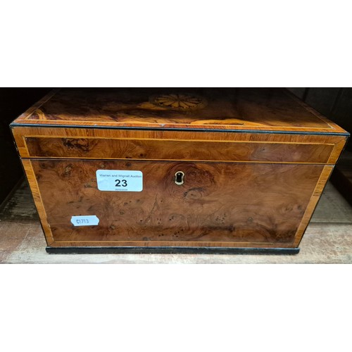 23 - An antique tea caddy with 3 section and an inlaid patera to the lid