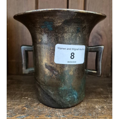 8 - A vintage cast mortar, heavy brass, with markings to base