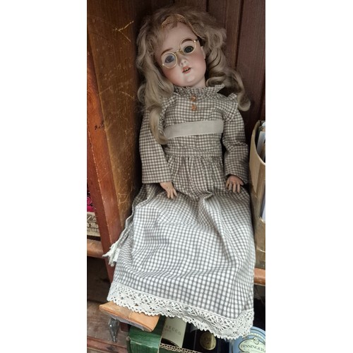 18 - An antique German bisque headed doll marked The Dollar Princess and numbered 59