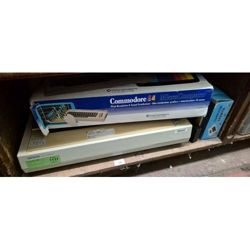39 - A Commodore 64 console , a dot matrix printer, a Sinclair ZX81, and a Phonemark Computer Cassette