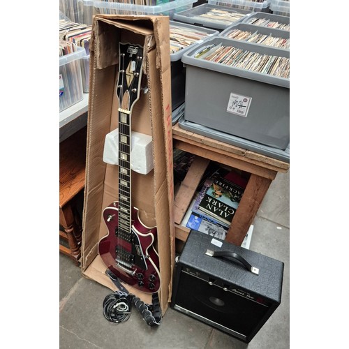 45 - A Hondo II electric guitar with a Linear Linnet Five amplifier