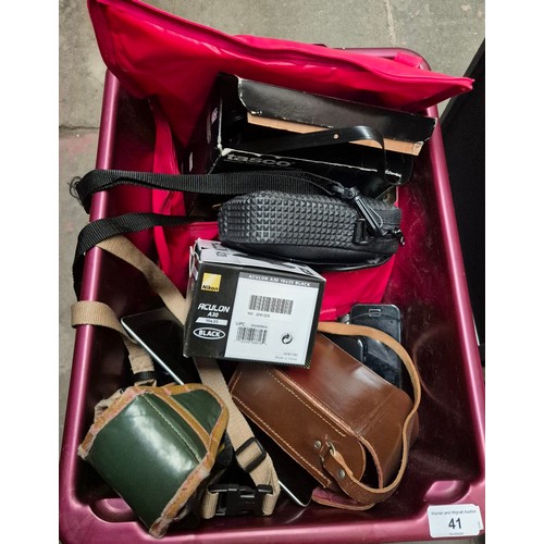 41 - A box of cameras, binoculars, tablets etc