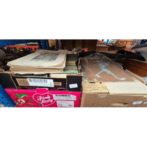 147 - Three boxes of assorted books.