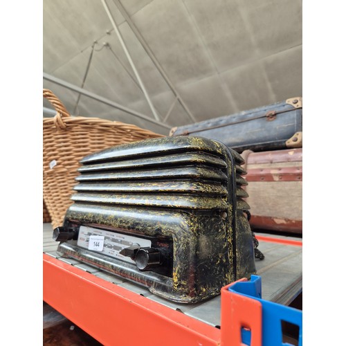 144 - A vintage KB BM20 green and yellow bakelite radio.