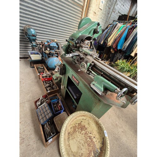 125 - A Myford Super 7 lathe with disconnected Brooks Motors Gryphon motor and 4 boxes of accessories