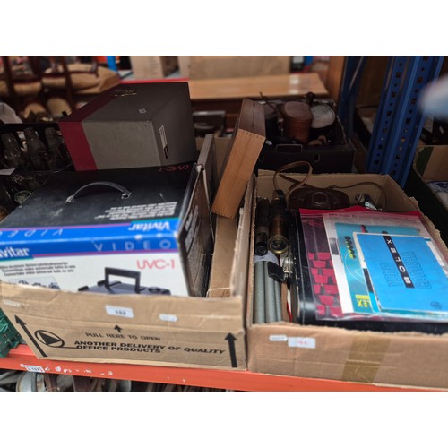 152 - A mixed lot of camera items including two telescopes, a Bolex cine camera, 35mm camera, together wit... 