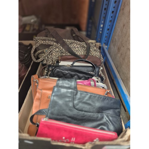 154 - Two boxes of assorted handbags to include Radley, Fiorelli, Tula & YSL etc.