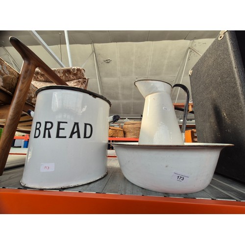 173 - An enamel bread bin and similar washbowl and jug