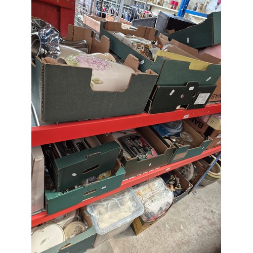 180 - 16 boxes on 3 shelves, containing miscellaneous items including vases, glass ware, ornaments, pictur... 