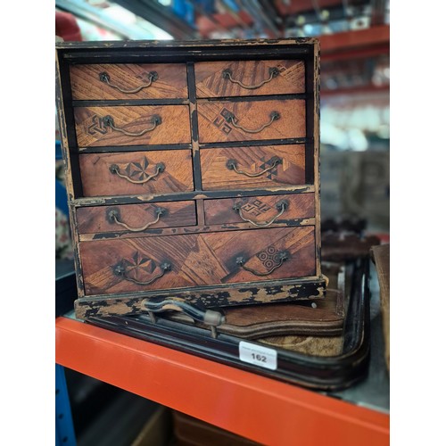 162 - A multi drawer cabinet, a spoon rack and a breakfast tray