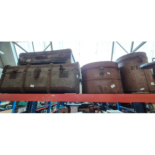 137 - 2 vintage suitcases and 2 vintage flour bins